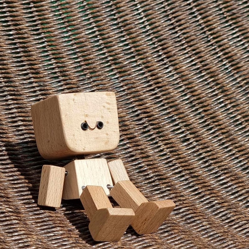 Shaking Wooden Man Figurine